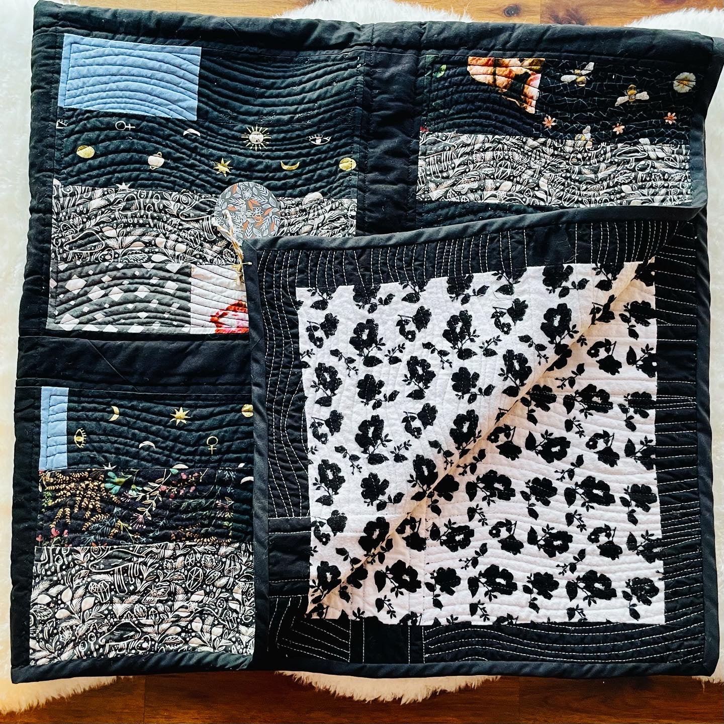 Quilt in Black, Blue, Violet and Grey.